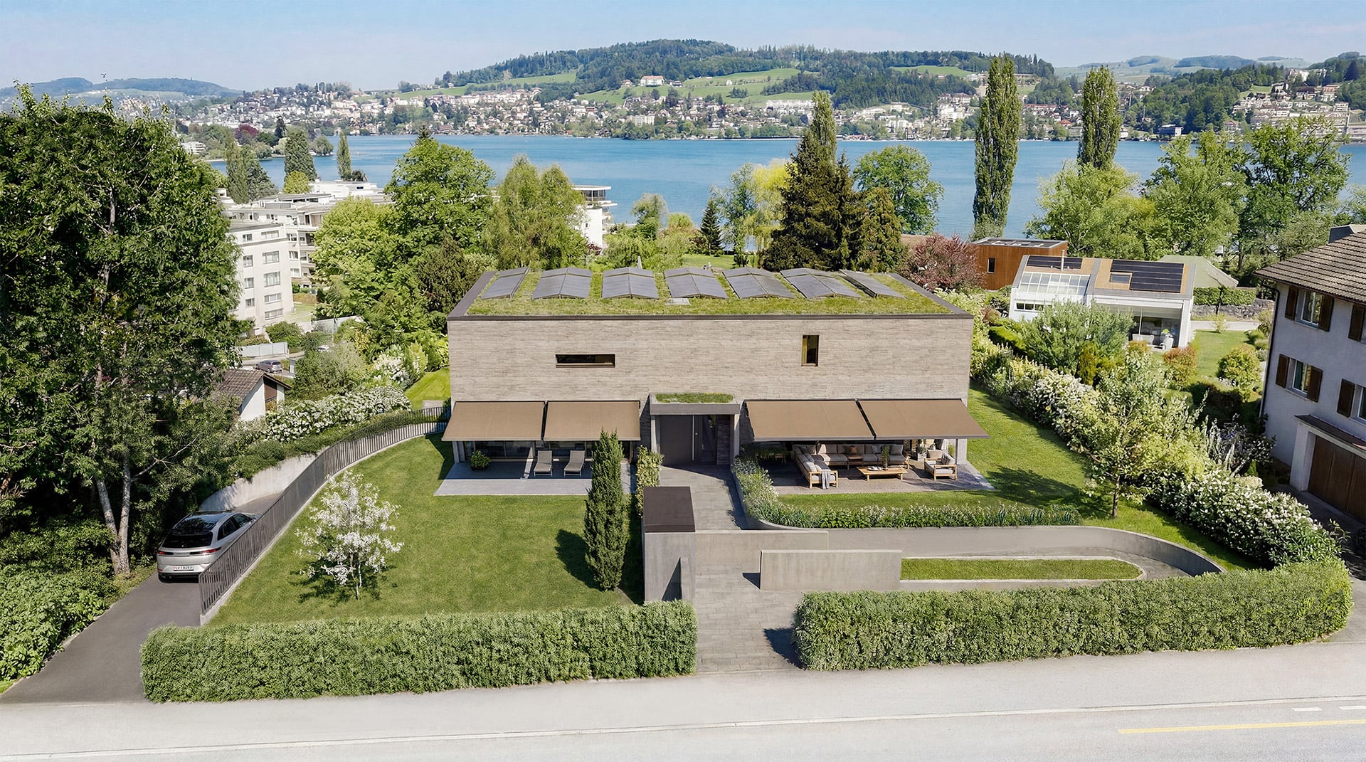 Seelinie 11 — Südfassade mit Garten und Vierwaldstättersee